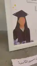 Watch this step-by-step guide on creating a beautiful graduation photo frame using paper cutouts and Arabic calligraphy. Perfect for celebrating your academic achievements. by @rubaaomaar with Original Sound by rubaaomaar