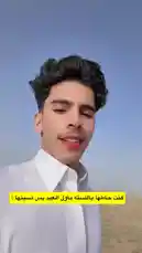 A young man, identified as Inam Sultan from the Eastern Province, shares a cheerful selfie video outdoors. Dressed in a crisp white collared shirt, he smiles brightly against a clear blue sky, creating an uplifting and relatable short-form content moment. by @by.sul with by.sul by Original Sound