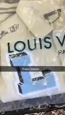 A close-up tour of a unique Louis Vuitton varsity jacket featuring 'LOUIS' lettering, Looney Tunes characters like Bugs Bunny, and classic collegiate details. This stylish piece blends luxury branding with playful pop culture elements. by @absi_fashion with absi_fashion by Contains: Baba - Amr Diab