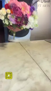 Watch as عبير ال زيدان | فنـــون الهدية demonstrates the art of creating a beautiful flower bouquet. From selecting vibrant blooms like gerberas and tulips to the precise technique of wrapping them in elegant grey paper and securing with a white ribbon, this step-by-step guide covers the entire process. See the final product displayed beautifully, ready to be gifted. by @gift_arts1 with gift_arts1 by Original Sound