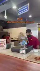 Step into the world of a pizza chef with this immersive POV experience from الرمــــــــال-restaurant! Watch as staff members in red uniforms prepare dough and cook pizzas in a traditional stone oven, all while managing orders on modern tablets. This behind-the-scenes look offers a unique perspective on the fast-paced environment of a busy pizzeria. by @sandshawarma with Original Sound by sandshawarma