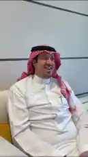 In this short-form educational clip from UFM RADIO🎙, a panel of Saudi men and a woman are presented with a quiz to identify their national bird. An image of a large eagle in flight is displayed on screen, accompanied by multiple-choice options in Arabic. The participants react with laughter and lively discussion, offering guesses like 'Golden Eagle' and 'American Eagle' before arriving at the correct answer. The video captures a moment of lighthearted national pride and cultural engagement. by @ufmradio with Original Sound by ufmradio
