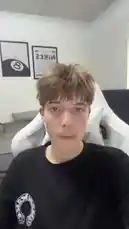 In this vlog-style clip, Artem sits in his white gaming chair and talks directly to the camera. He discusses his day and shares details about his room, which features framed posters of an '8 Ball' and 'NIKE'. The video provides a personal glimpse into his daily life and interests. by @artems-snap with Original Sound by Contains: Confident (Single Version) - Justin Bieber, Chance The Rapper