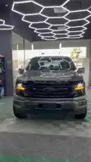 This video provides a comprehensive look at the Ford F-150 Raptor, showcasing its rugged off-road tires, distinctive black wheels, and aggressive front grille. The tour continues inside, highlighting the modern dashboard, large touchscreen display, and advanced driver controls. Experience the power and technology of this high-performance truck. by @armoronn with Original Sound by armoronn
