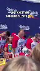 Witness Joey Chestnut in action during the famous Nathan's Famous hot dog eating contest. This clip captures the intensity of competitive eating, featuring Chestnut and other top eaters battling it out on the iconic stage. by @marvedtv with Original Sound by marvedtv