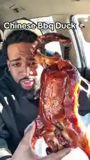 In this food review, MARVED TV dives into a delicious Chinese BBQ Duck. He showcases its signature crispy skin, tender meat, and a special dipping sauce, all enjoyed inside his car. The video also includes a quick look at the restaurant where he got the duck, making it a complete 'foodie' experience. by @marvedtv with Original Sound by marvedtv