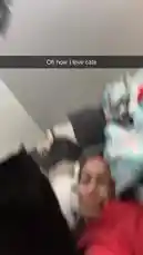 In this intimate and heartwarming clip, Alison Rossum shares a quiet moment of affection with her black cat. Lying comfortably in bed under colorful blankets, she gently interacts with her pet as it nuzzles close to her face. The scene captures the simple joy and companionship found in everyday life with a beloved animal, creating a relatable and soothing visual. by @alison.rossum with alison.rossum by Original Sound