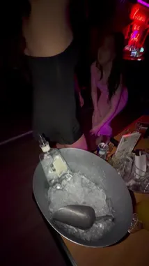 Get an insider's look at Justin Marc's night out at the vibrant Belaire lounge. This energetic scene captures him and friends dancing under dazzling red and purple lights, enjoying drinks from a large ice bucket, and soaking in the lively club atmosphere. by @sexxyjustin with Original Sound by sexxyjustin
