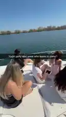 A group of young women are having a great time on a boat on a beautiful sunny day. They are relaxing, sunbathing, and enjoying the view of the city skyline. The video captures the fun and carefree atmosphere of a summer day out on the water. by @sexxyjustin with Original Sound by sexxyjustin