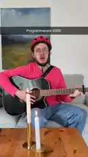 This engaging video follows Sommarkatten through his day as a 'Programmerare 2026'. It captures him playing guitar at home, working on his laptop, cycling to work past landmarks like BabySam and ZOO, and even checking his professional profile. The scenes blend music, work, and urban life, offering a glimpse into the daily routine of a modern programmer. av @sommarkattens med Original Sound av sommarkattens