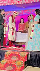 Witness key moments from Aman Malik's wedding ceremony, showcasing traditional attire like the sherwani and lehenga, ceremonial garlands, and joyful interactions among guests on a beautifully decorated stage. by @officialaman08 with Original Sound by officialaman08