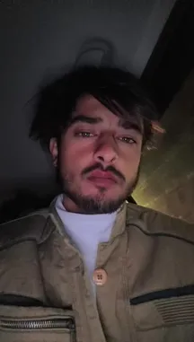 In this intimate, self-shot clip, Uzair captures a candid moment from inside a car at night. Dressed in a white turtleneck and a tan jacket, he looks directly into the camera with a contemplative expression before running his hands through his dark hair. The dim lighting and shaky camera create a raw, personal atmosphere. by @uzairr271 with uzairr271 by Original Sound