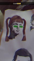 Preview for a Spotlight video that uses the Green Glasses & Bangs Lens