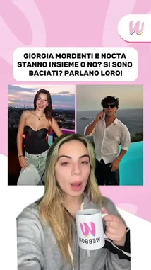 A female influencer from Webboh.it discusses the latest rumors about Italian model Giorgia Mordini and social media personality Nocta being in a relationship. She presents photos of the couple and analyzes their public interactions, including a moment where they were seen together in what appears to be a car, providing her take on whether their relationship status is confirmed. by @webboh.it with Original Sound by webboh.it