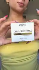 A step-by-step guide to using SANA K's Oriental wax for hair removal. This tutorial shows you how to prepare the wax by microwaving it, apply it with a wooden spatula, and use Kerasoin professional strips for a smooth epilation experience. by @sanakparis with Original Sound by sanakparis