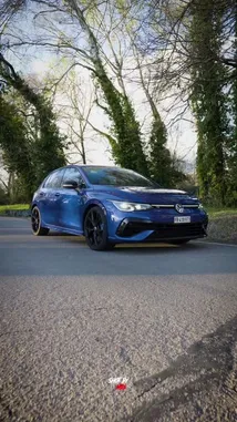 Witness EA Location 31's dynamic automotive journey. This fast-paced montage captures a sleek blue Volkswagen Golf R in stunning detail, from its aggressive styling and sporty interior to thrilling high-speed drives on city streets and winding roads. Experience the car from every angle, including a unique aerial perspective, showcasing the power and precision of modern performance vehicles. by @ealocation with Original Sound by Contains: Je veux que toi - JUL