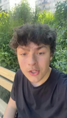 A young man from Team Azure films himself in a park, holding a green water gun. He walks around the playground equipment, including a slide, before sitting down on a seesaw. Throughout the video, he speaks in French, mentioning being in the park, finding it empty, and joking about pranking people with his water gun. by @justeazure with Original Sound by justeazure