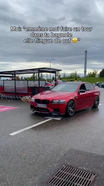 Watch as AnasDC takes his striking red BMW M5 for a spin, starting in a parking lot and cruising down a scenic road. The car's sleek design and powerful presence are highlighted throughout the journey. by @anasdc01 with Original Sound by anasdc01