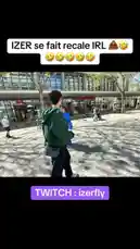 In this candid street encounter, popular streamer IZER is confronted by a woman who confronts him about something he did wrong. They stand on a sunny city sidewalk, engaged in an animated conversation. The woman points her finger and gestures emphatically, while IZER listens and responds. The interaction appears to be a spontaneous 'recall' or 'takedown,' capturing a moment of public accountability. by @izerflyy with Original Sound by izerflyy