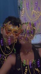 Preview for a Spotlight video that uses the MARDI GRAS MASKS Lens