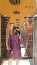 A man named Easy Going takes a stylish mirror selfie inside a modern elevator with mirrored walls. He is wearing a purple patterned kurta and white pants, showcasing his outfit. The video captures the unique reflections created by the mirrors. by @vipularora05 with Tu Meri Main Tera Main Tera Tu Meri - Title Track (From "Tu Meri Main Tera Main Tera Tu Meri") by Vishal-Shekhar / Vishal Dadlani / Shekhar Ravjiani / Anvita Dutt