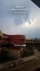 Experience a first-person walking tour through the Keshav Mahavidyalay campus in New Delhi, India. This immersive walkthrough showcases the college's distinctive red-brick buildings, open courtyards, and modern staircases under a dramatic sky, providing a glimpse into its academic environment. by @lil.ishhhh with original sound