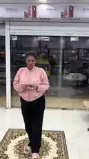 A woman excitedly unboxes a new iPhone at محل السوبر الذهبي للهواتف, showcasing the phone and its accessories. The store features Honor branding, indicating a multi-brand electronics retailer. by @super_golden7 with Original Sound by super_golden7