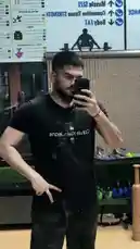 In this behind-the-scenes look, fitness enthusiast D SUN 🇦🇪🇮🇳 shares his personal progress tracking method using a mirror selfie. He points to his physique while standing in front of a gym's body composition chart, demonstrating how he monitors changes in muscle size and fat percentage over time. This real-life example offers viewers a practical way to assess their own fitness journey. by @dsunmusic with original sound