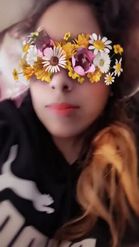 Preview for a Spotlight video that uses the Face Flowers Lens