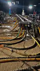 This high-impact, real-time footage captures the intense environment of an offshore drilling rig at night. Viewers are taken through a maze of heavy-duty hoses, control systems, and industrial equipment under powerful floodlights. The scene reveals the complexity and scale of modern energy operations, showcasing the intricate network of pipes and machinery essential for successful drilling. With every frame, the raw power and precision of industrial engineering come to life. by @tomasg3901 with original sound