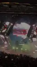 Experience Sasha's electrifying live concert from an audience perspective. Watch as the stage erupts with vibrant, geometric light patterns, dynamic pyrotechnics, and massive video screens displaying abstract visuals. The energy of the crowd is palpable as they raise their hands under sweeping spotlights and colorful beams, creating an immersive spectacle. by @squashha with squashha by Original Sound