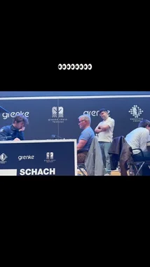 Witness the intense atmosphere of a live chess tournament. This clip captures players deeply focused during a critical game, surrounded by officials and spectators. The event, branded with 'grenke' and 'SCHACH', showcases the strategic depth and concentration required at the highest levels of competitive play. by @chesscom with Original Sound by chesscom