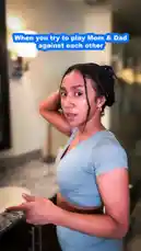 This comedic skit features a woman in a bathroom setting, followed by a man in a home office environment. Both individuals react with exaggerated expressions and gestures, suggesting they are playfully trying to 'play mom and dad against each other' as indicated by the on-screen text. The video captures a relatable and humorous family interaction. by @theclassiiics with Original Sound by theclassiiics