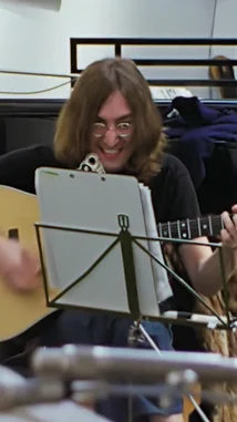 This short, black-and-white montage captures iconic moments from John Lennon's life, featuring him in various settings including interviews and musical sessions. The video includes text overlays like 'Pure John Lennon Shenanigans For 49 Seconds' and 'Which one are you?', creating a playful and nostalgic tribute. by @thebeatles with Original Sound by Contains: Don’t Let Me Down (First Rooftop Performance) - The Beatles