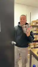 In a warehouse filled with boxes, KaseMe holds up several phone cases, discussing his personal favorites. He shows off a floral design, a 'funky' graphic case, and a pink case with a Parisian theme, explaining his choices and preferences. von @kasemedesign mit kasemedesign von Original Sound