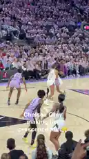 This dynamic clip captures a pivotal moment from a WNBA game, showcasing a player in a white uniform executing a powerful drive to the basket against defenders in purple. The crowd, dressed in matching purple shirts, creates an electric atmosphere, cheering loudly as the play unfolds. The fast-paced action highlights the athleticism and skill of professional women's basketball. by @wnba with Original Sound by wnba