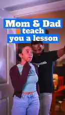 A young woman stands in a doorway, looking nervous as her parents flank her. Her mother holds a clipboard and pencil, while her father stands behind her with his hands raised. They appear to be giving her 'a lesson,' creating a humorous and relatable scene about parental discipline. by @theclassiiics with Original Sound by theclassiiics