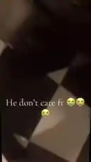 A sad black cat sits alone on a checkered floor, its body language radiating loneliness. The text overlay 'He don't care fr 😭😭😭' suggests it's been abandoned or ignored by its owner. This poignant scene captures the emotional depth of pets, making it a relatable and shareable moment for animal lovers. by @rizznmemes with Original Sound by rizznmemes