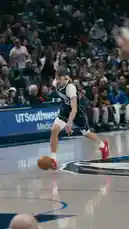 Watch Luka Doncic (#32) lead the Dallas Mavericks in a thrilling game against the Denver Nuggets. This clip captures his signature crossover, powerful drive to the basket, and a spectacular dunk over Nikola Jokic. The crowd erupts as the Mavericks secure the win, with a celebratory 'Congrats Cooper' message flashing on screen. by @mavs with original sound