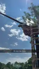 Witness a thrilling moment as a man launches himself from a towering wooden platform into a scenic lake below. The sequence captures his full dive, culminating in a massive splash that sends water flying over the heads of people enjoying inner tubes nearby. This is a classic summer adventure perfect for thrill-seekers. by @digiflips with Original Sound by digiflips