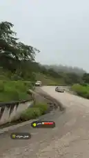 This captivating video begins with a scenic drive along a winding mountain road shrouded in fog. It then transitions to a lush green field, possibly a farm or wild area, before revealing a surprising sight: a white plate filled with raw meat, likely chicken, resting on the grass. The entire journey is set to traditional Arabic music, creating a unique blend of travel vlog and culinary surprise. by @nowaira-11 with اهلي🥹❤️❤️❤️❤️ by .