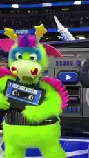 Witness the electric atmosphere as the Orlando Magic mascot takes center stage at a game, only to be dramatically 'defeated' by the Detroit Pistons' victory. The scene shifts to a fan proudly holding his child in a Pistons jersey, celebrating their team's advancement. The video culminates with the Pistons' mascot joyfully dancing and holding a 'GO TO ROUND 2 LOUD' sign, capturing the pure excitement of the moment. by @nbapistons with Original Sound by nbapistons