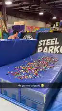 Witness Chris Colditz perform a daring parkour flip off a high platform at Steel City Parkour, landing perfectly into a massive pit filled with colorful LEGO bricks. This high-energy stunt showcases impressive athleticism and precision. by @chriscolditz with Original Sound by chriscolditz