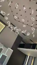 This captivating interior design showcase features a stunning ceiling installation of suspended ring lights, creating a mesmerizing ambient effect. The sleek, contemporary space blends minimalist architecture with innovative lighting techniques, ideal for modern homes, offices, or commercial venues. Watch as the dynamic interplay of light and shadow transforms the environment into a visually striking experience. by @djsefo with original sound