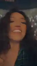 This dynamic, first-person perspective video follows Sasha as she immerses herself in a massive live concert. The footage begins with her smiling face, then pans across a sea of fans holding up their phones to create a breathtaking 'sea of lights.' The camera then focuses on the stage where performers in sharp suits are illuminated by dramatic beams of light and fog, delivering an energetic show to the enthusiastic crowd. The overall atmosphere is one of excitement and shared musical experience. by @squashha with squashha by Original Sound