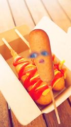 Preview for a Spotlight video that uses the Corndog Face Lens