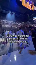 In a tense moment before a game, Golden State Warriors player Gary Payton II is seen waiting for his teammates to finish their pre-game warm-up routine. His expression shifts from anticipation to visible shock and disbelief as he realizes he's been left behind. The scene captures a candid, behind-the-scenes moment of team dynamics and player camaraderie. by @warriors with Original Sound by Contains: LEGACY 2 - Ogryzek