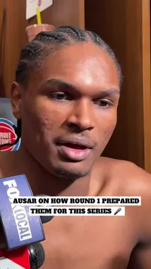 A shirtless NBA player gives a post-game interview in a locker room setting. He speaks into multiple microphones, including one from FOX Sports, discussing the physicality of the current playoff series and how his team was better prepared due to experience gained in a previous matchup. The atmosphere suggests a candid moment after a challenging game. by @nba with Original Sound by nba