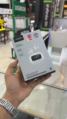 This video provides a hands-on look at the UGREEN ClipBuds Magic earbuds, showcasing their unique design with a full-color touchscreen display on the charging case. The presenter highlights features such as touch controls for music and calls, noise isolation, IP54 water and dust resistance, dual-device connectivity, and AI-powered noise cancellation. The review is conducted in a tech store setting, focusing on the product's functionality and design. by @point_tech1 with Original Sound by point_tech1