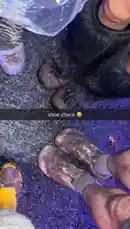 A first-person perspective captures a group of hikers navigating a wet trail. The camera focuses on their muddy boots and waterproof pants, highlighting the rugged conditions. A voice points out something of interest ahead, suggesting an exciting discovery during their outdoor journey. by @snapcreators with Original Sound by snapcreators